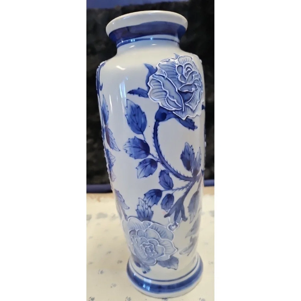 Blue and White Vase with Roses, Roses are outlined in the pottery so they show